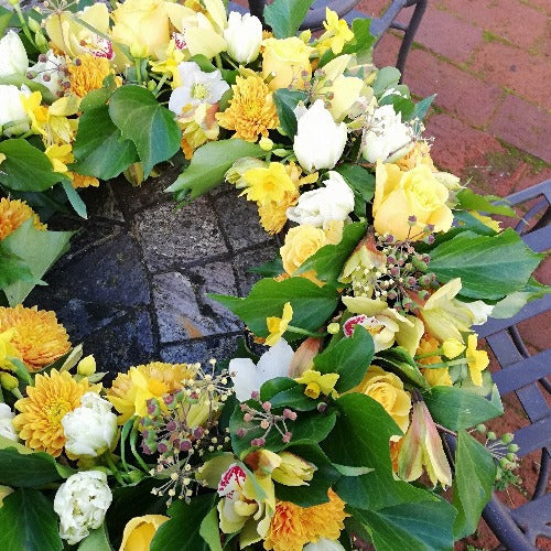 Colebrook Funeral Wreath, a cream and lime funeral wreath arranged fresh in our Winchester flower shop