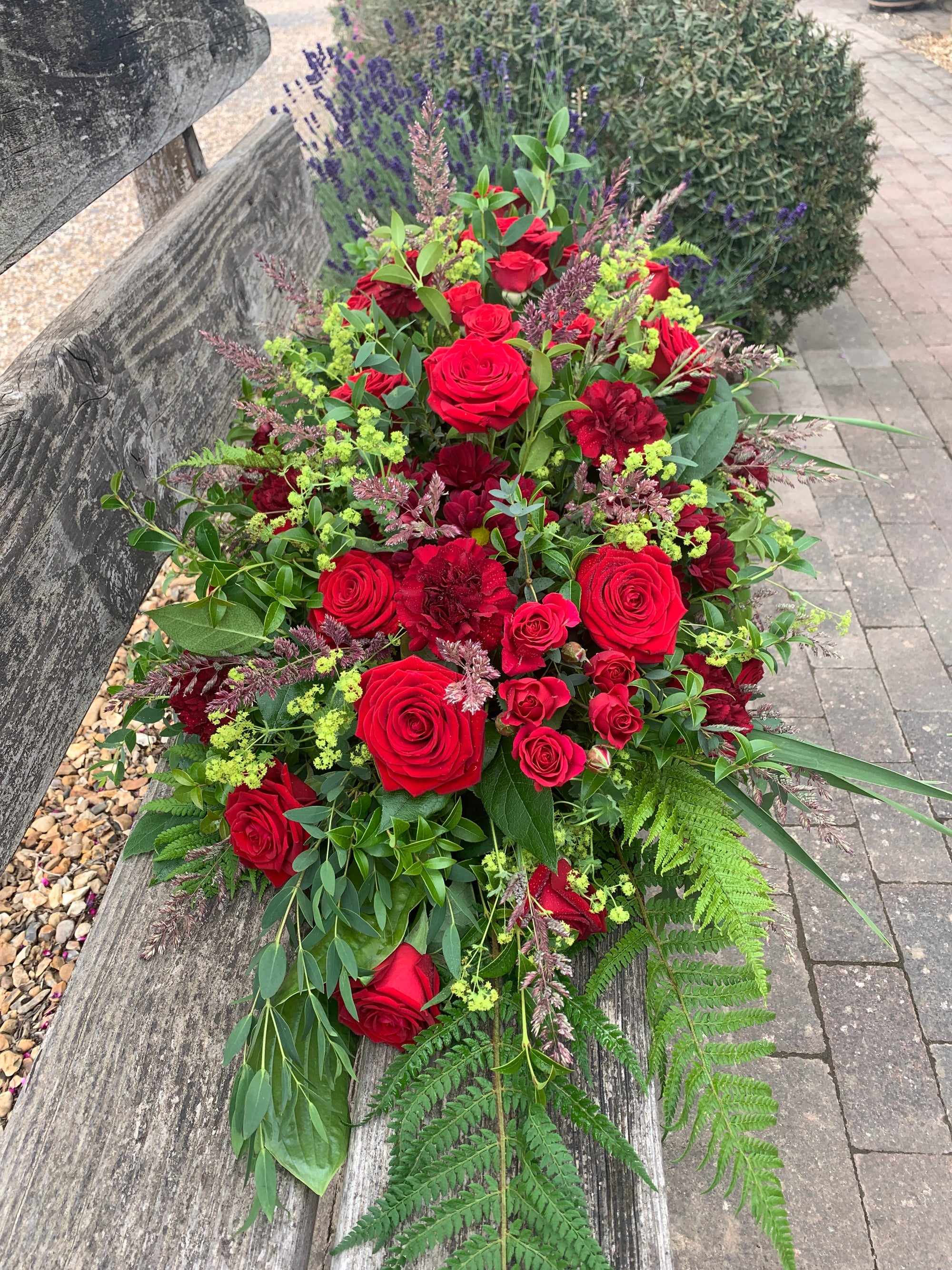 Athelstan Red Rose Casket Spray, a funeral casket spray hand-tied by our florists in Winchester