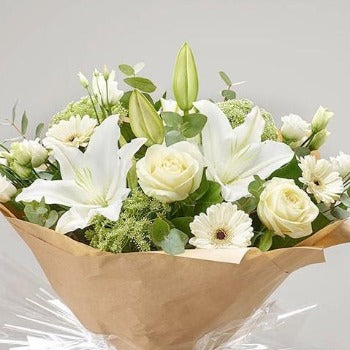 White Rose & Lily Sympathy Bouquet, a white bouquet hand-tied by our florists in Winchester