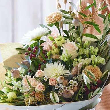 Hand-tied bouquet featuring a variety of SPRING  flowers. Winchester Florist Delivery Service