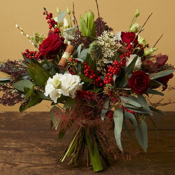 Soria Christmas Bouquet, a red bouquet hand-tied by our florists in Winchester