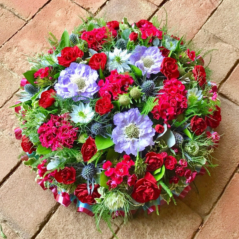 Florist Choice Posy Pad funeral tribute by The Petal Boutique Winchester