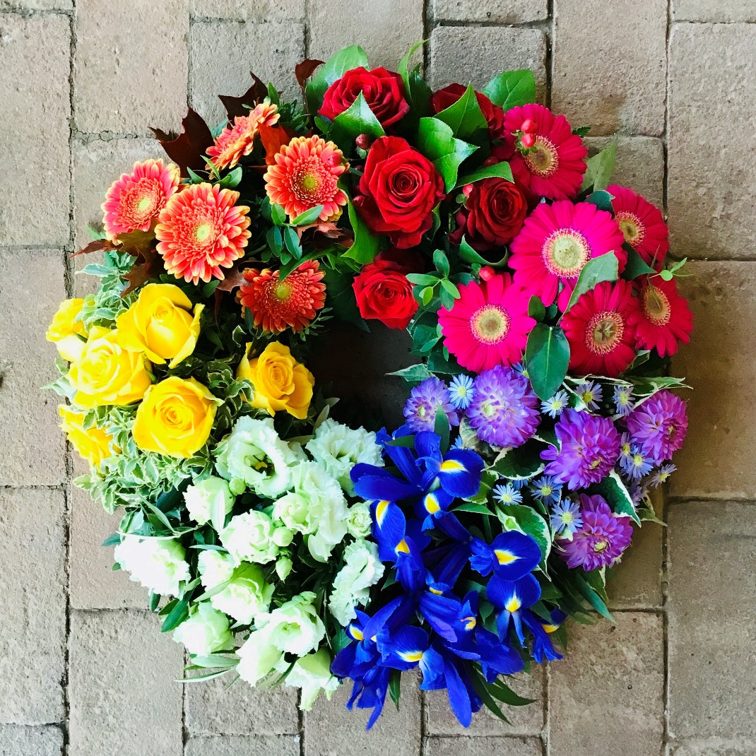 Rainbow Wreath funeral tribute by The Petal Boutique Winchester