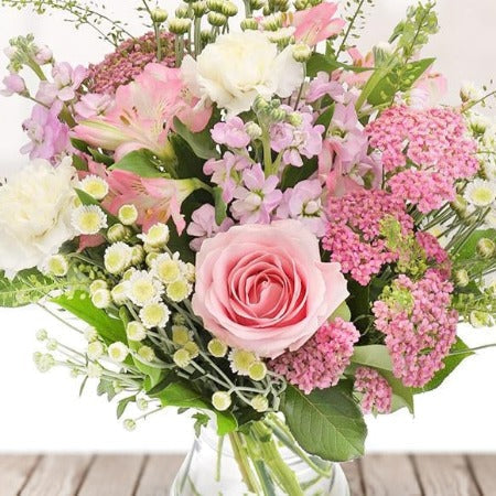 Example Petal subscription delivery - neat pastel hand-tied posy of pink roses and seasonal stems, Winchester florist